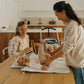 moment de change bébé sur matelas à langer tapilou